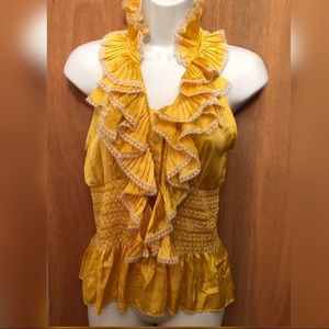 Yellow sleeveless ruffle blouse